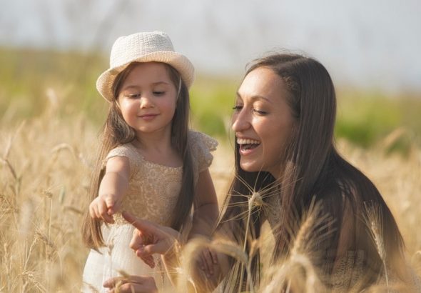 woman and girl on focus photography