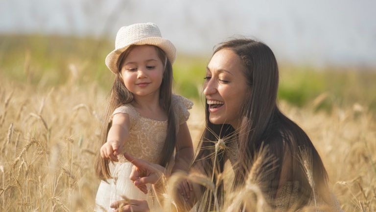 woman and girl on focus photography